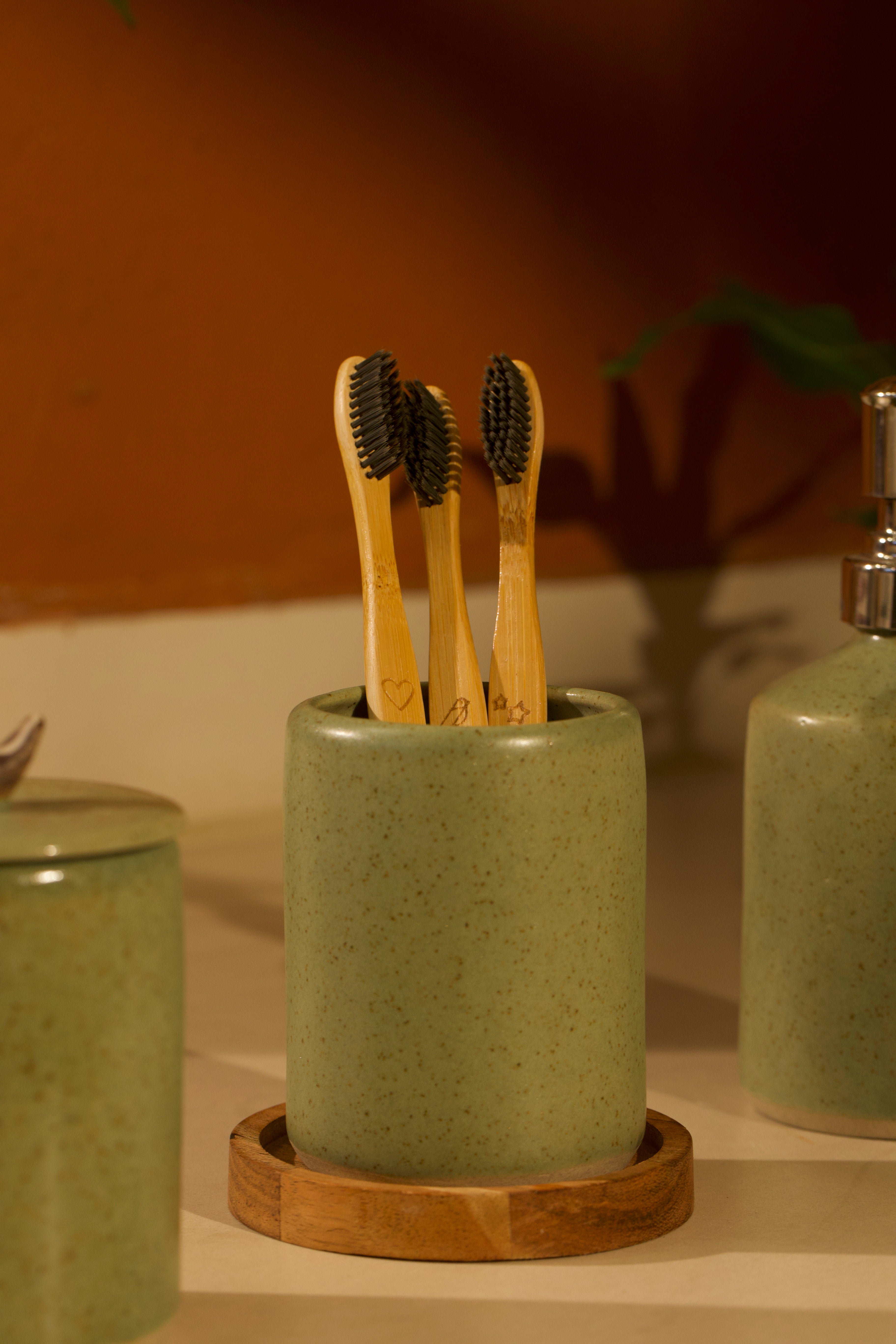 A ceramic holder on a bathroom counter. ceramic home décor online pottery home decor