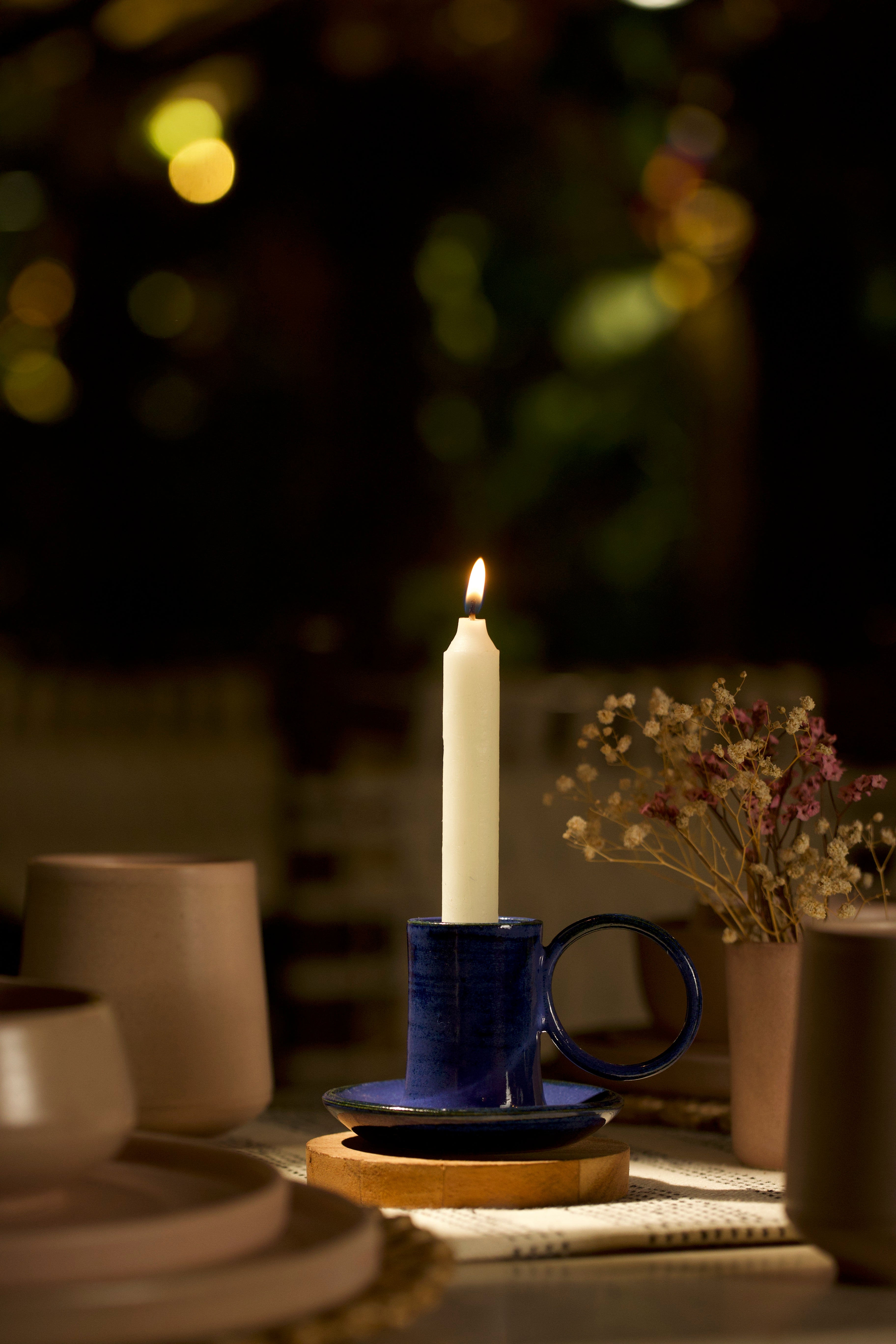 A navy holder on a table, handmade ceramics India, ceramic home décor online