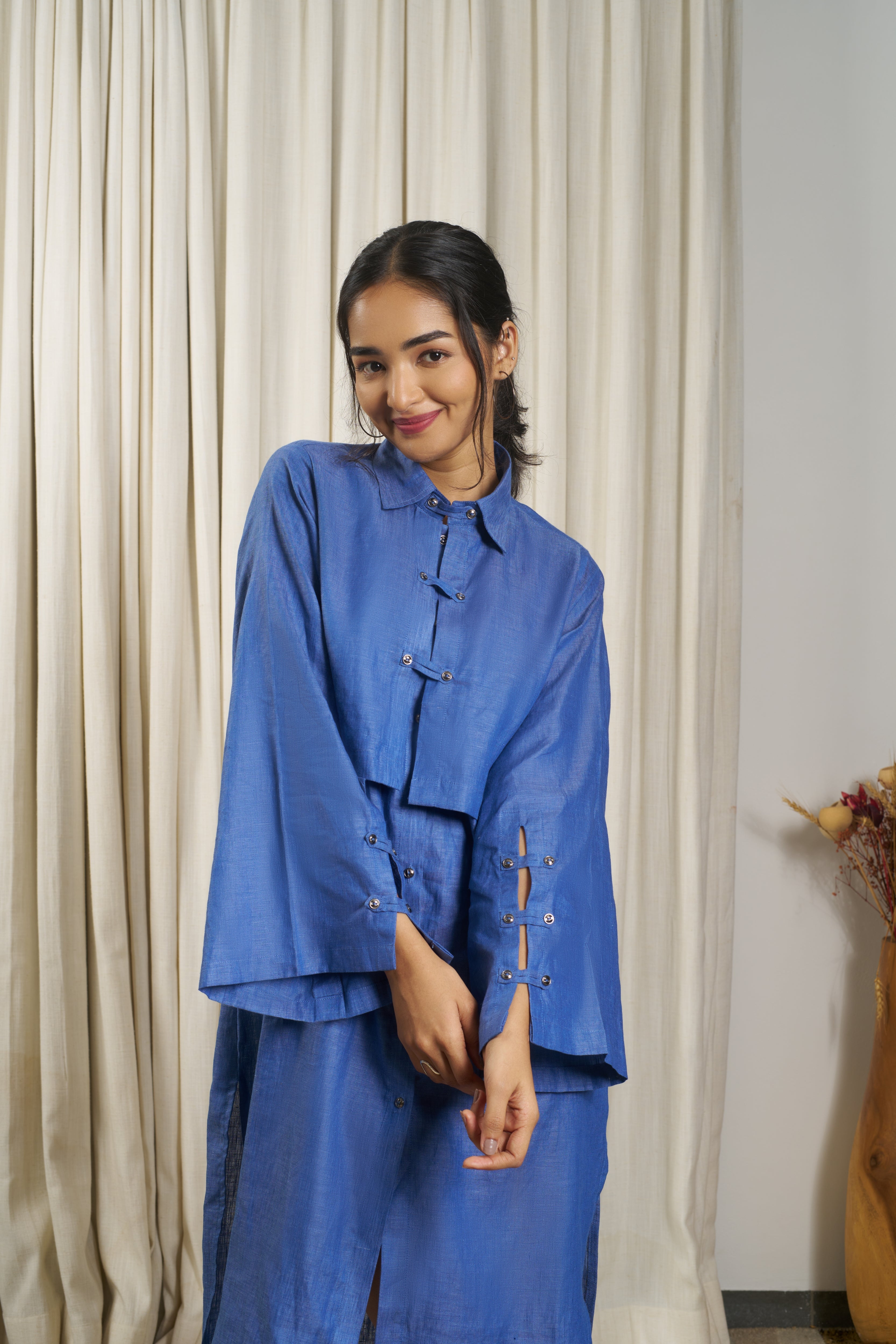 Woman wearing a blue outfit. comfortable linen dresses India, ethical clothing brands for women