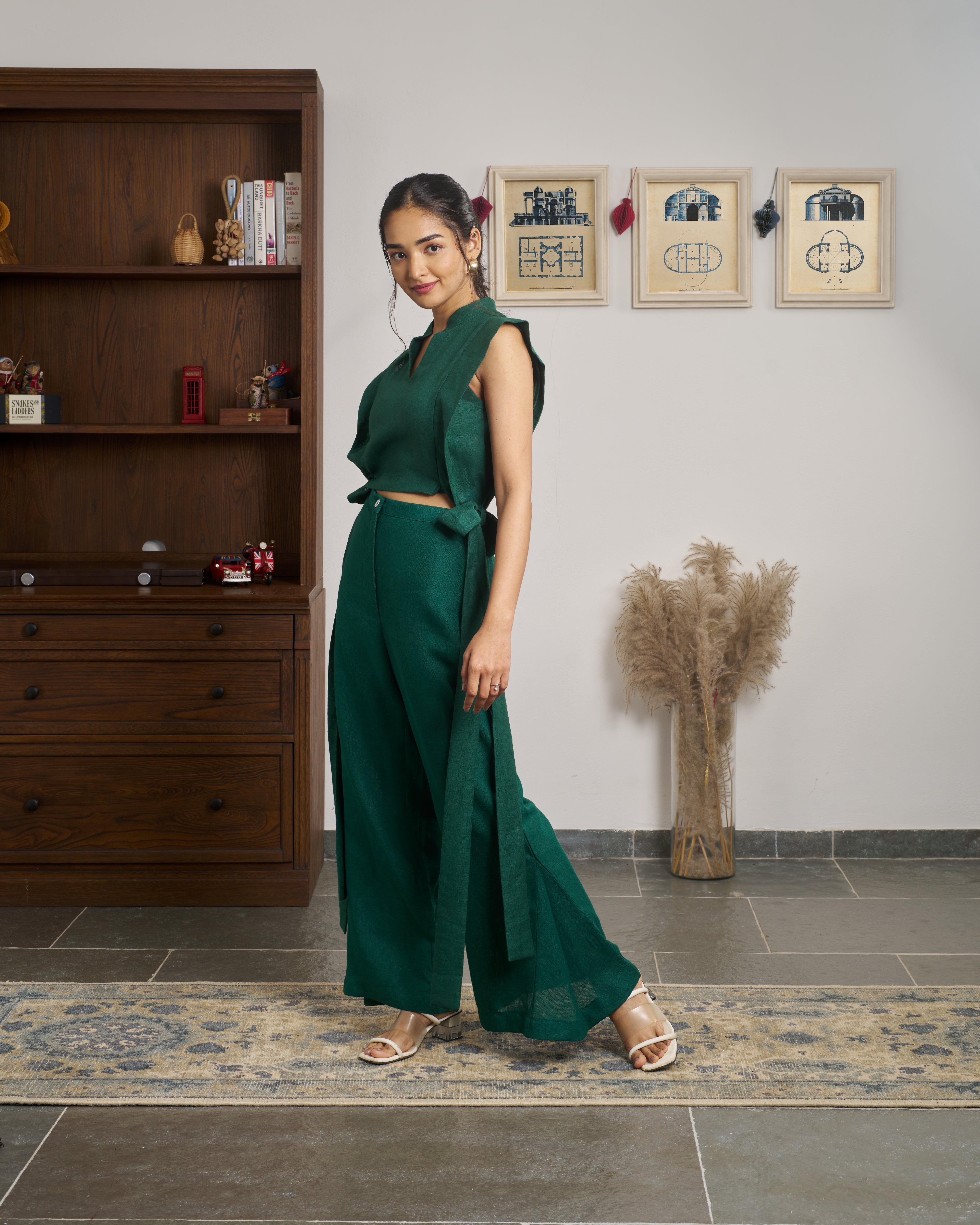 Woman wearing a green outfit.minimalist clothing brands India, everyday sustainable fashion India