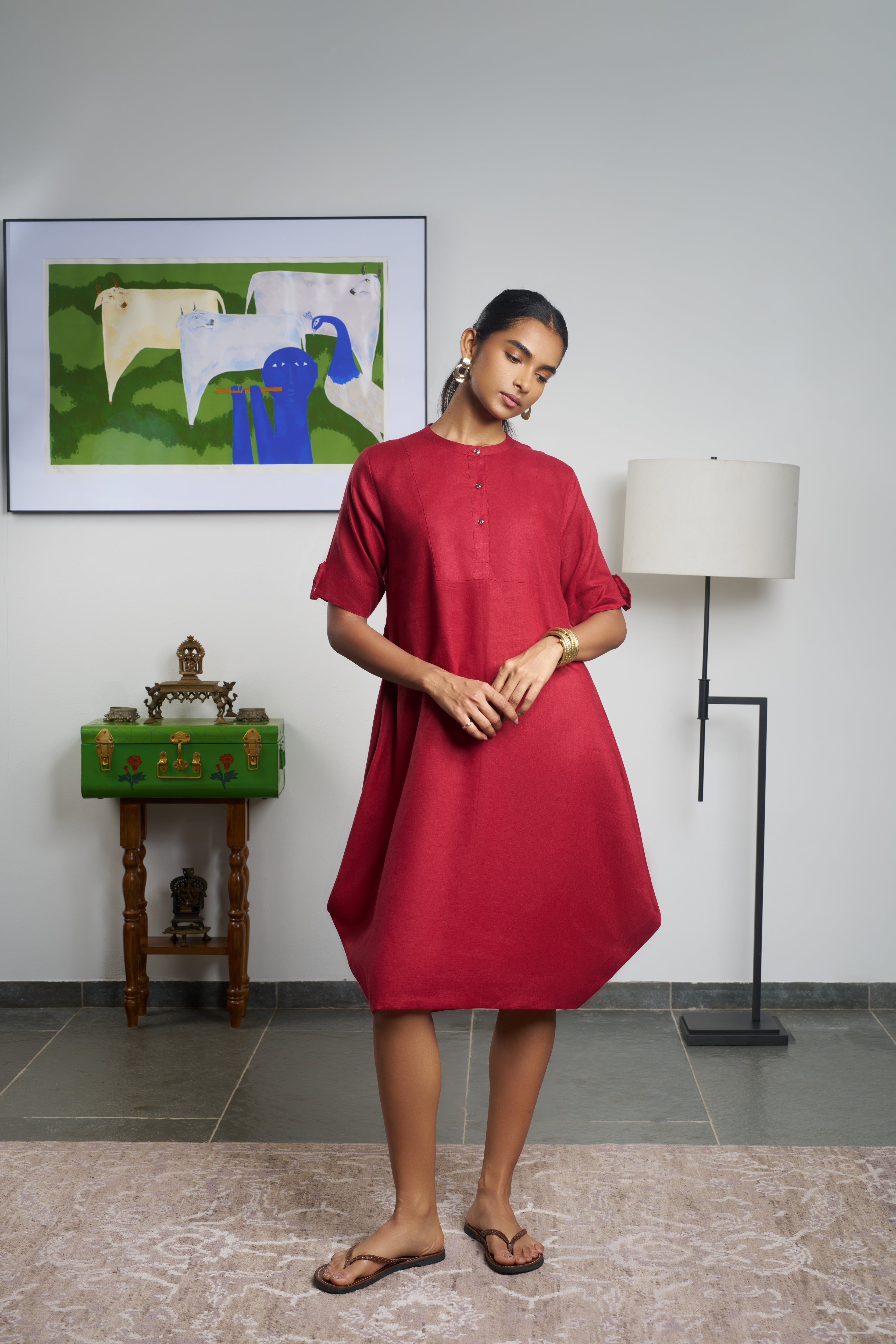 Woman in a red dress. linen dresses shop online, everyday sustainable fashion India