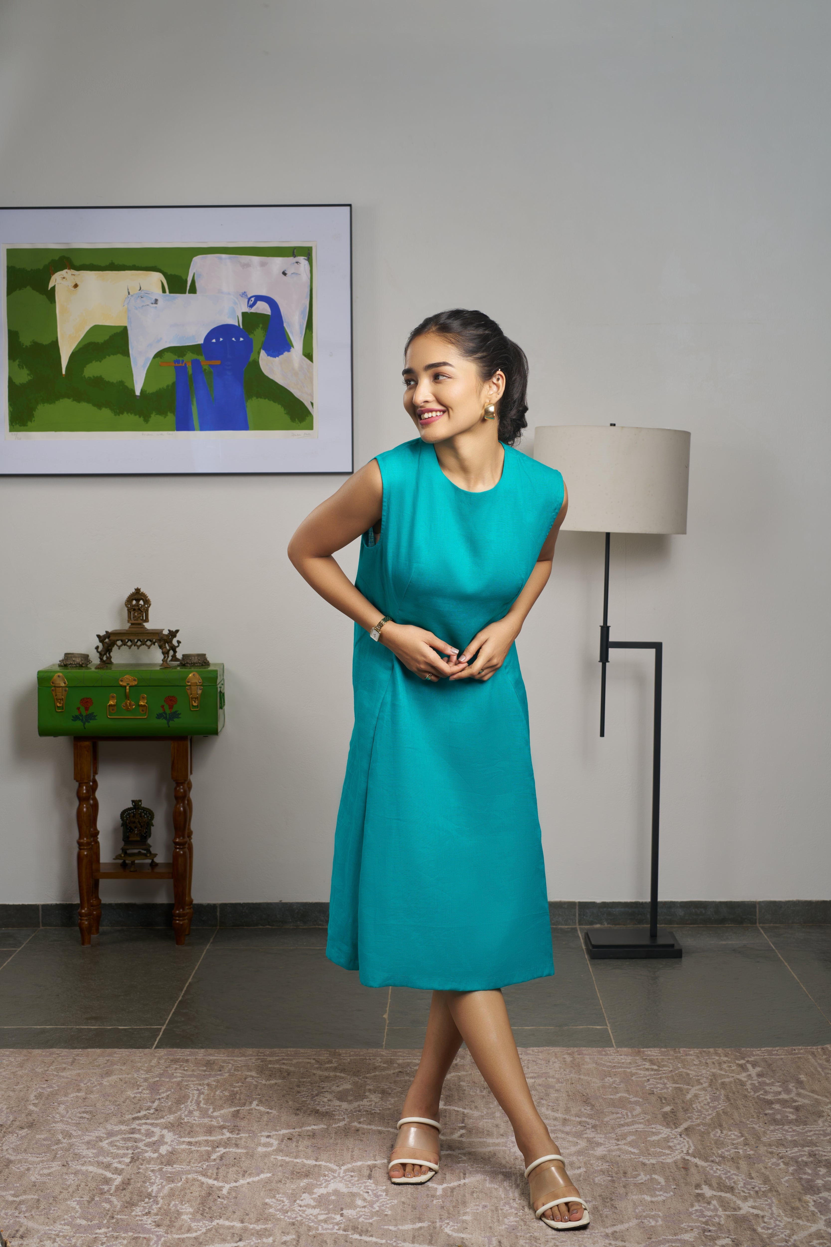 Woman in a teal blue dress. linen dresses for women India, comfortable linen dresses India