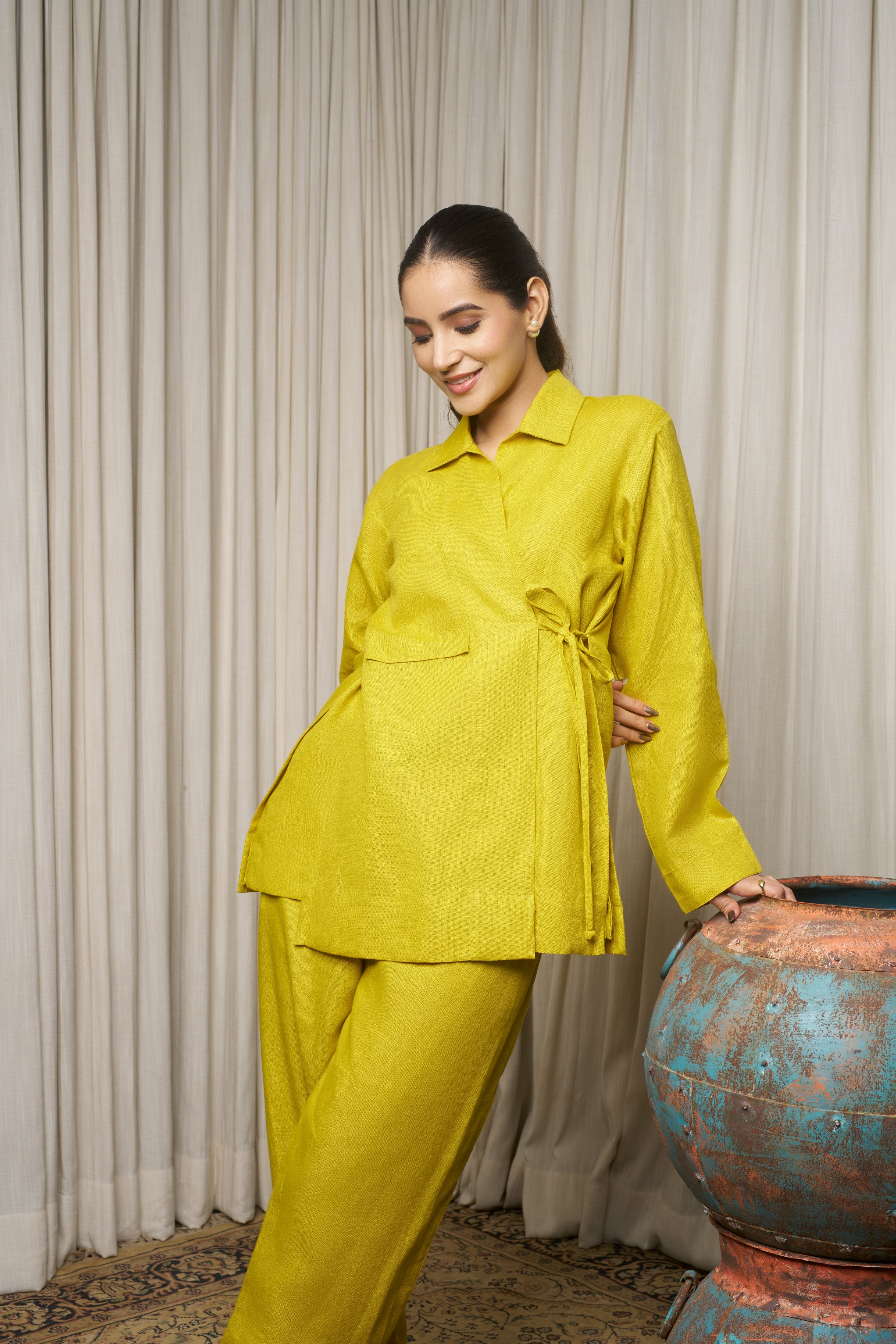 Woman in a bright yellow outfit.azo-free dyed clothes India, sustainable fashion brands India