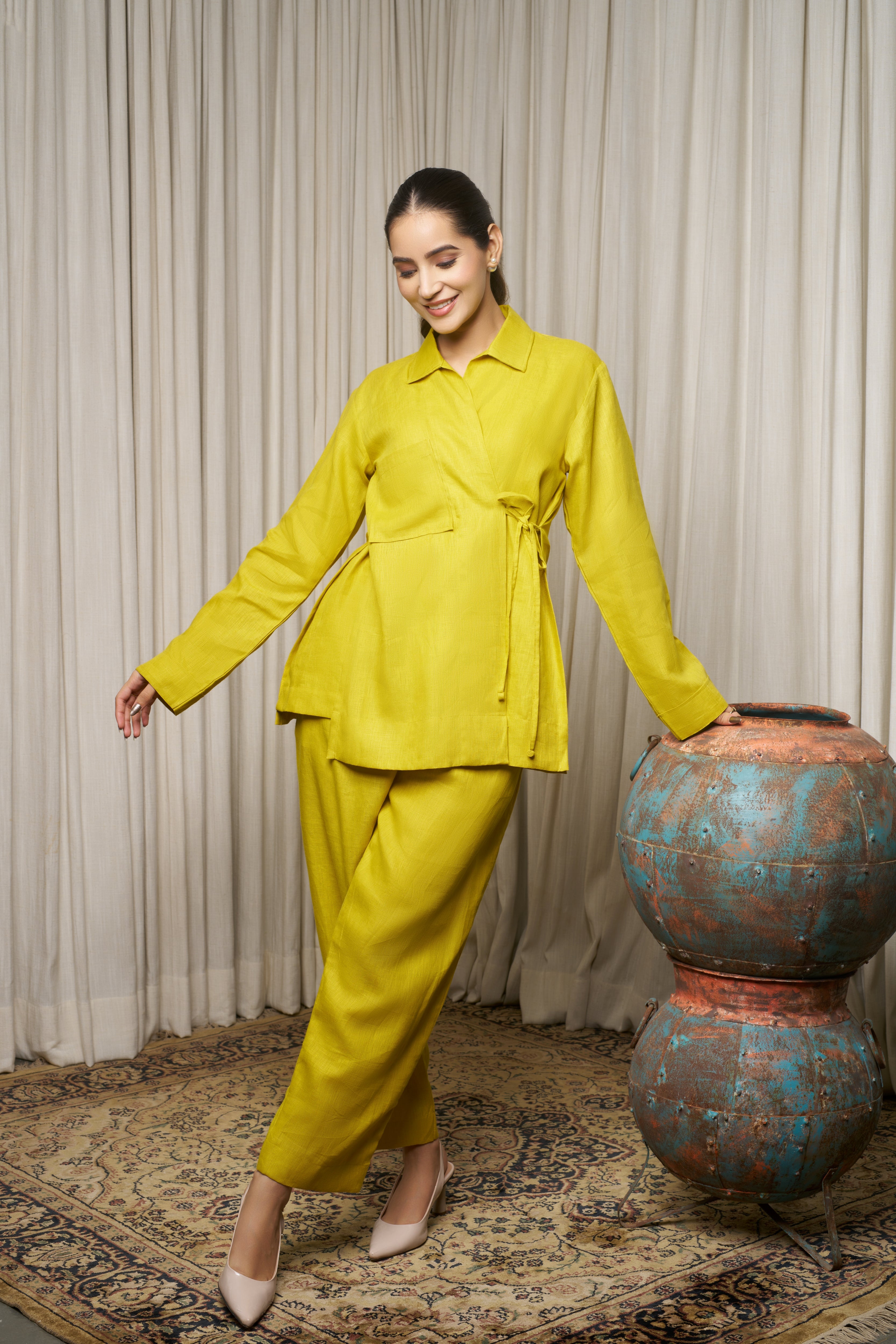 Woman in a bright yellow outfit.azo-free dyed clothes India, sustainable fashion brands India