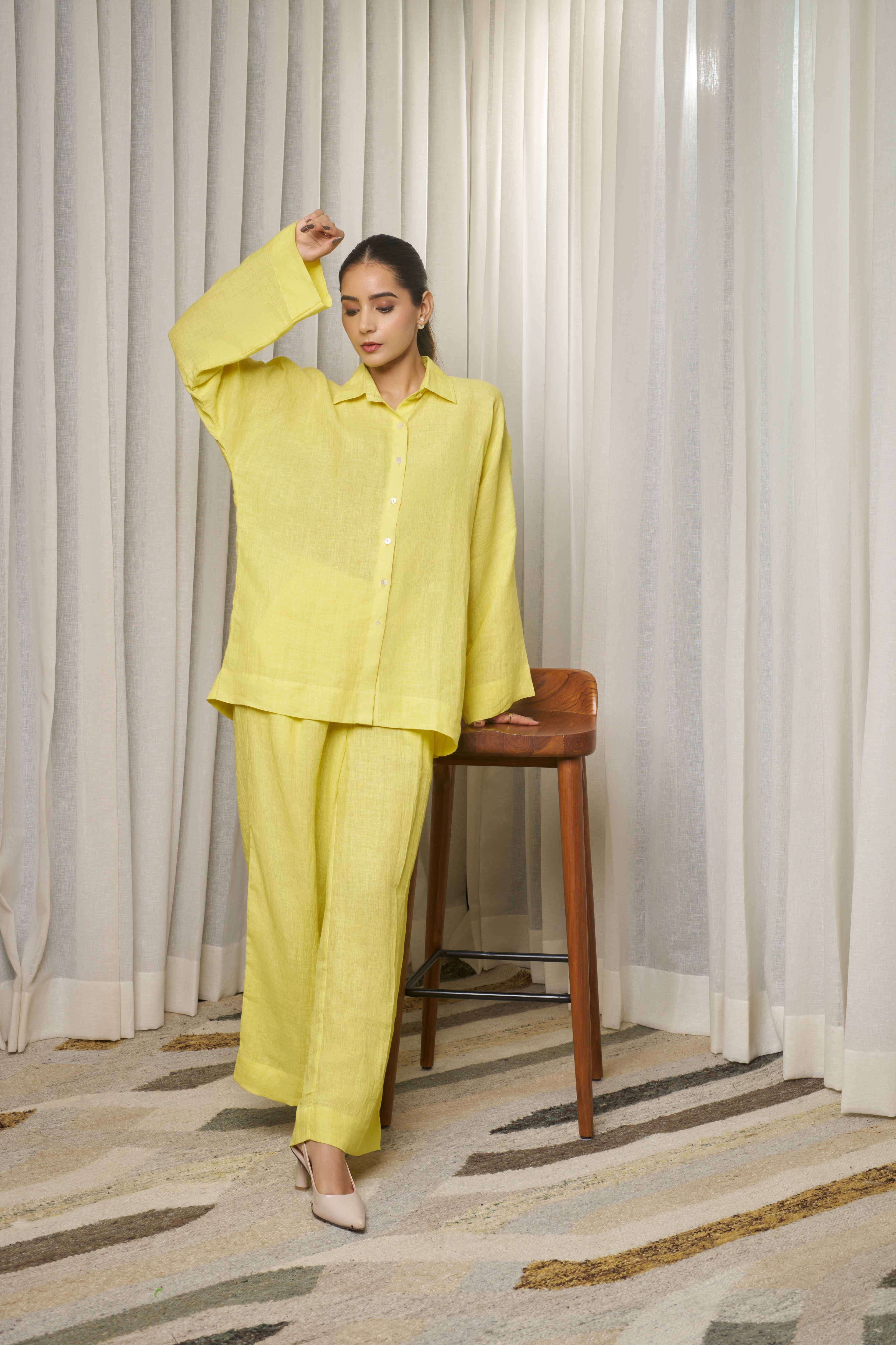 Woman in a yellow outfit. timeless women’s fashion, women’s linen clothing India