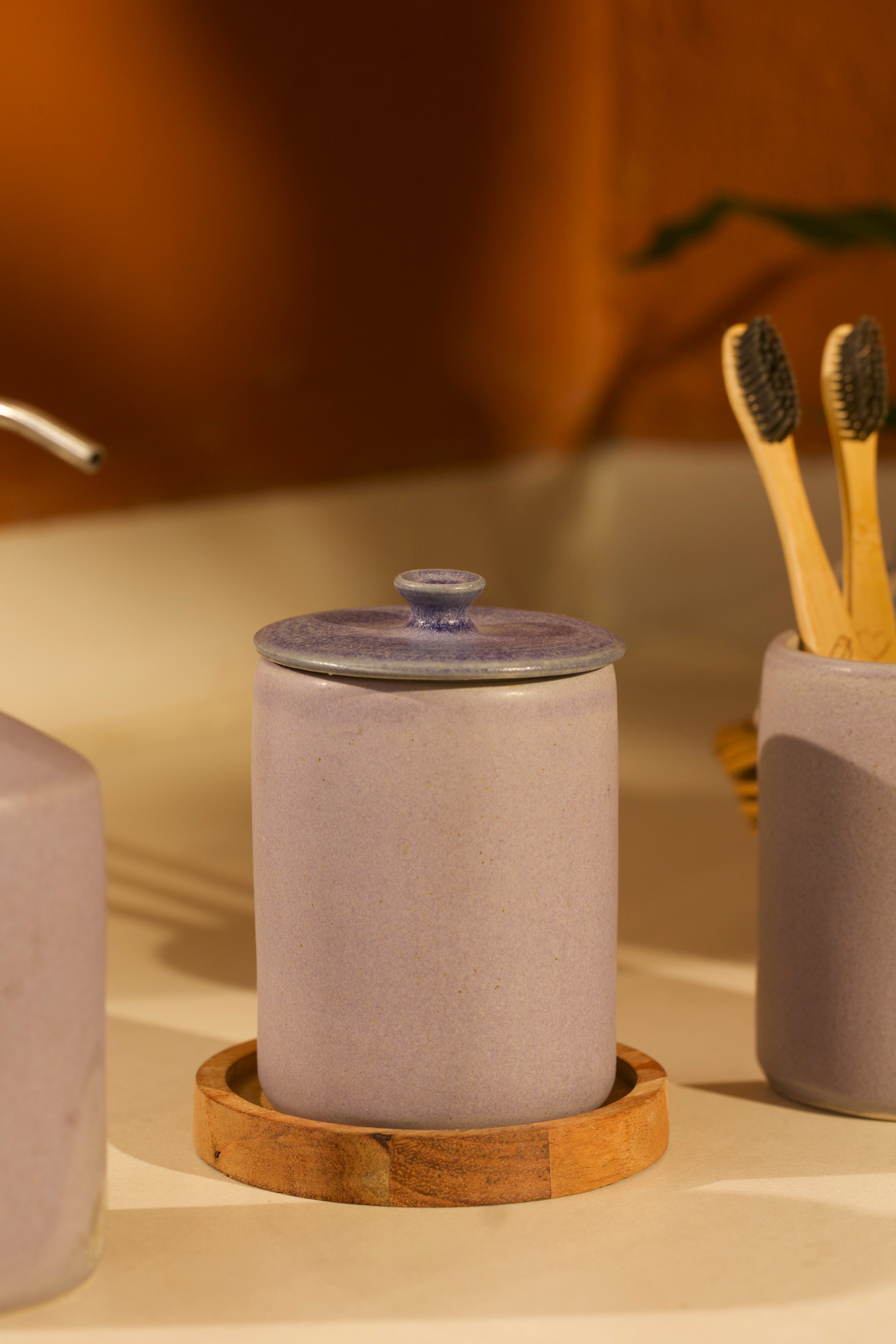 Ceramic jar with a wooden coaster and toothbrush holder, ceramic home décor online, pottery home decor