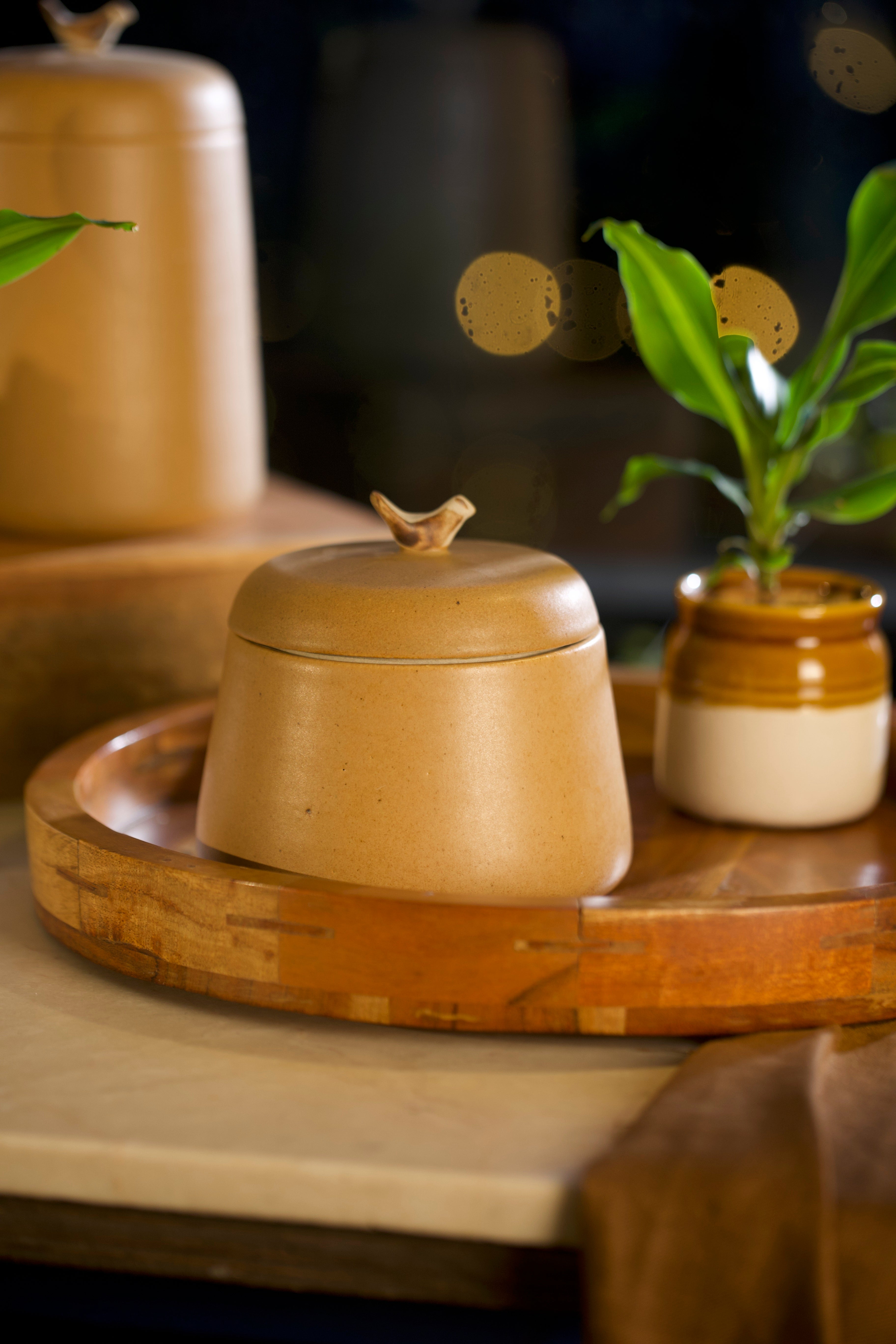 A mustard ceramic pot with lid on a wooden tray, pottery home decor, handmade serveware online