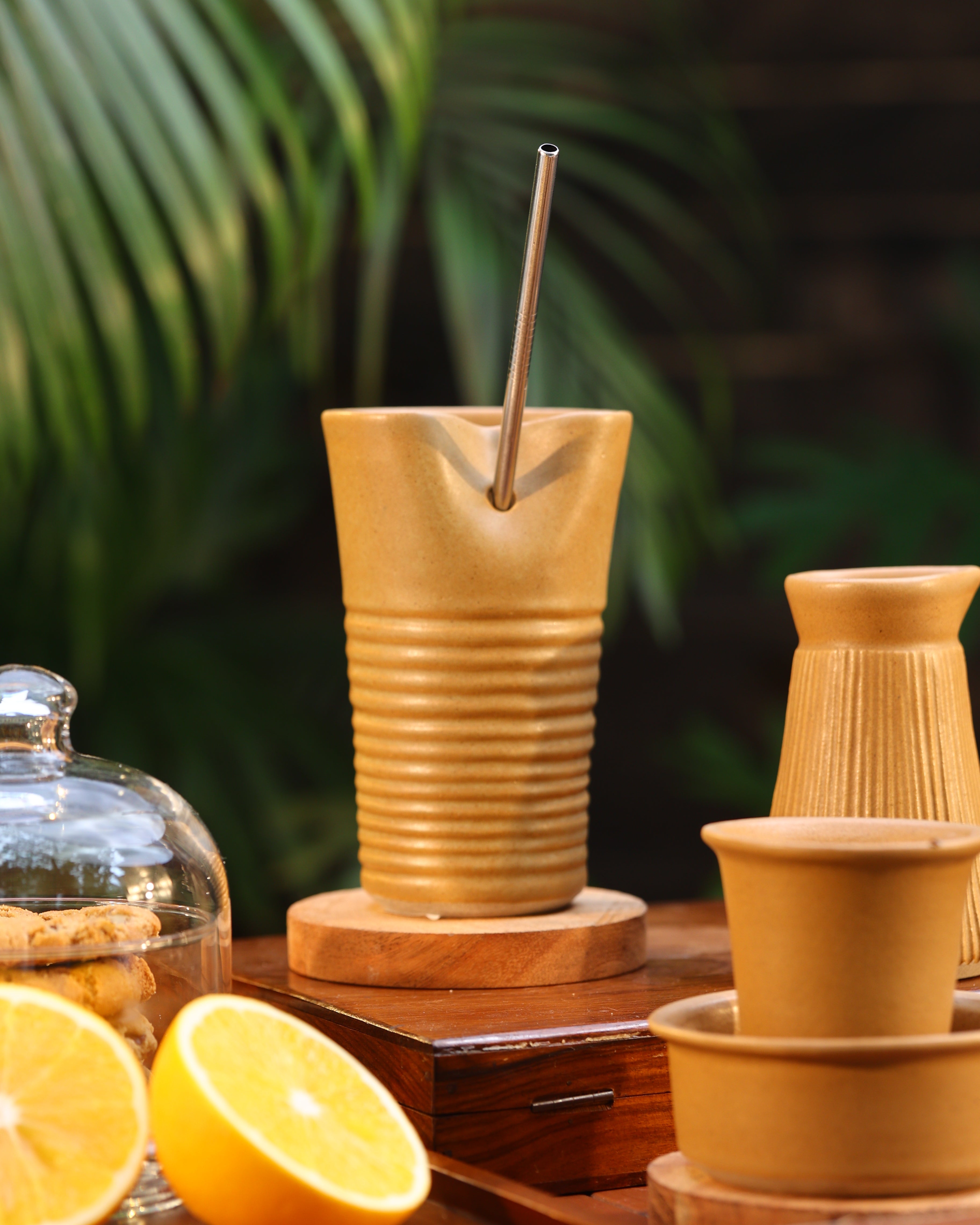 Mustard Tumbler with a metal straw, ceramic coffee mugs online, Indian pottery brands online