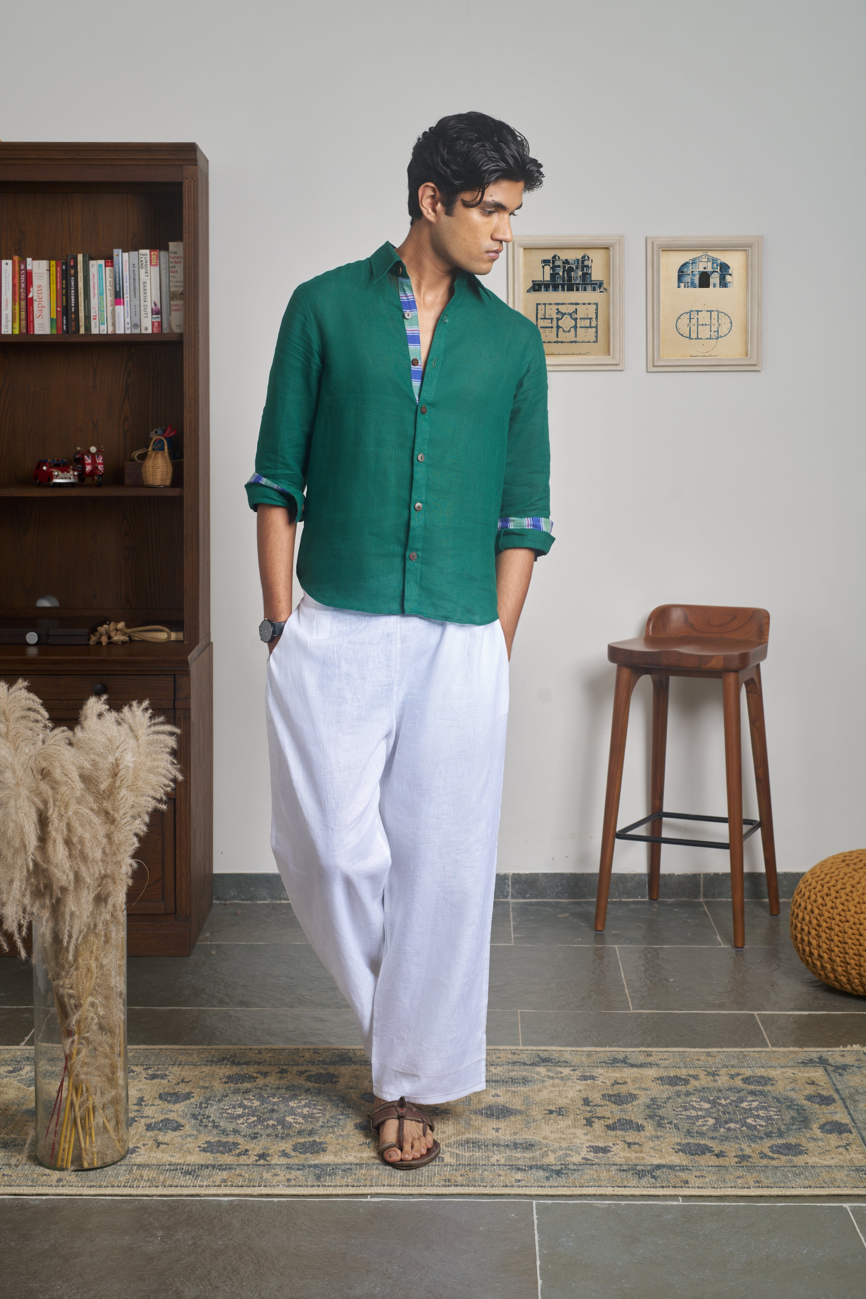 Man wearing a green shirt.  linen shirts for men India, sustainable fashion brands for men
