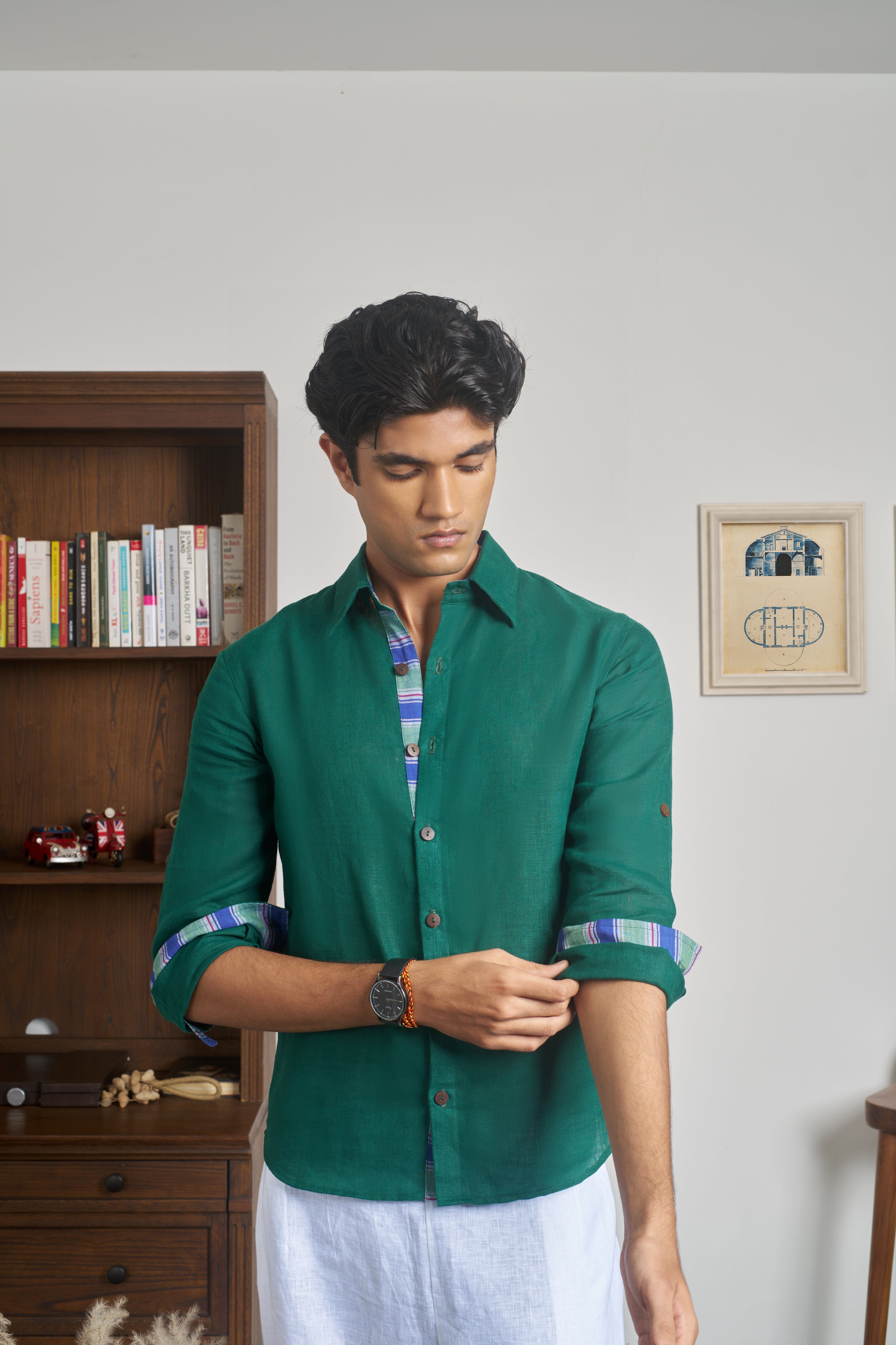 Man wearing a green shirt.  linen shirts for men India, sustainable fashion brands for men
