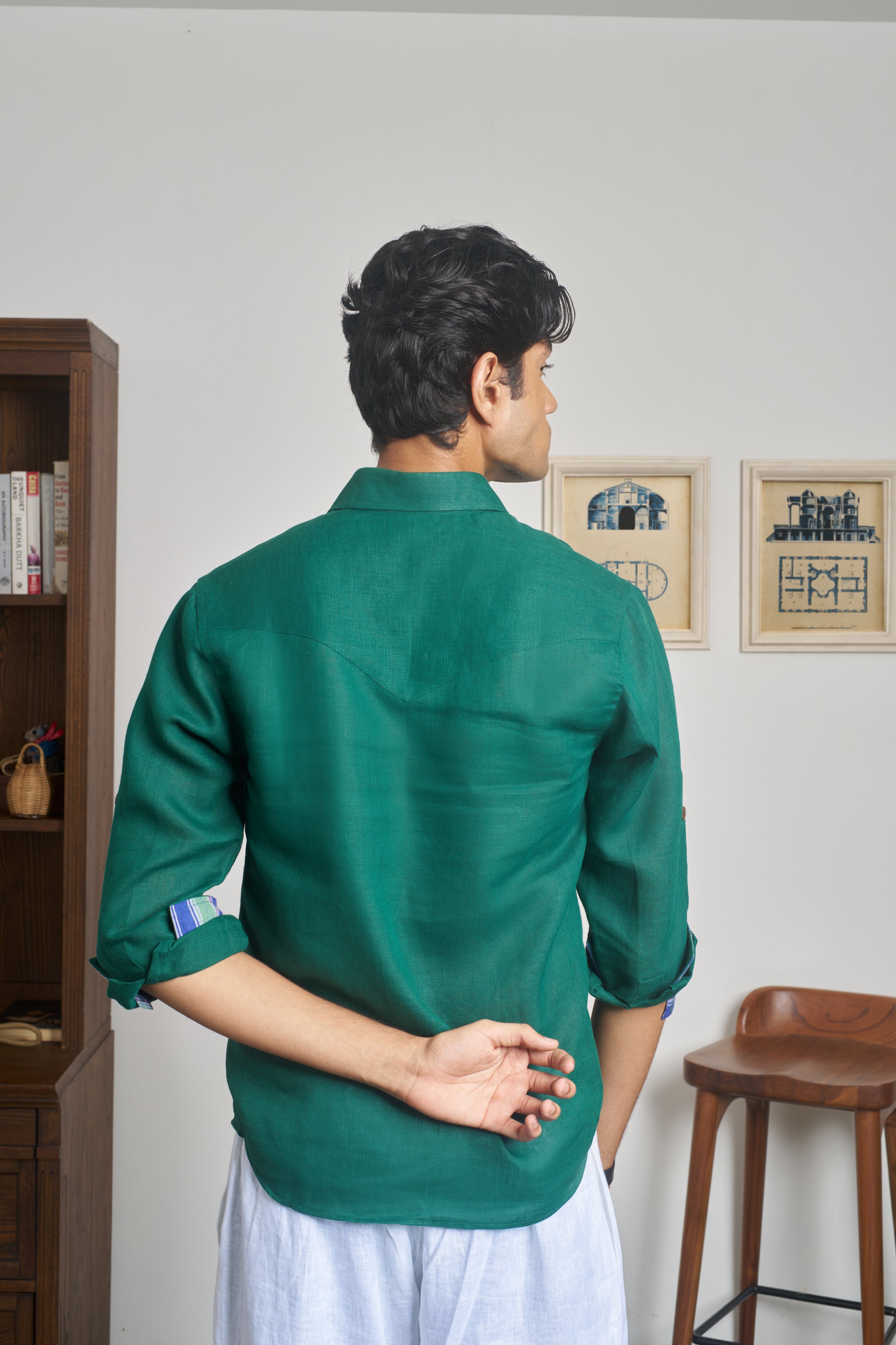 Man wearing a green shirt. linen shirts for men India,  sustainable fashion brands for men
