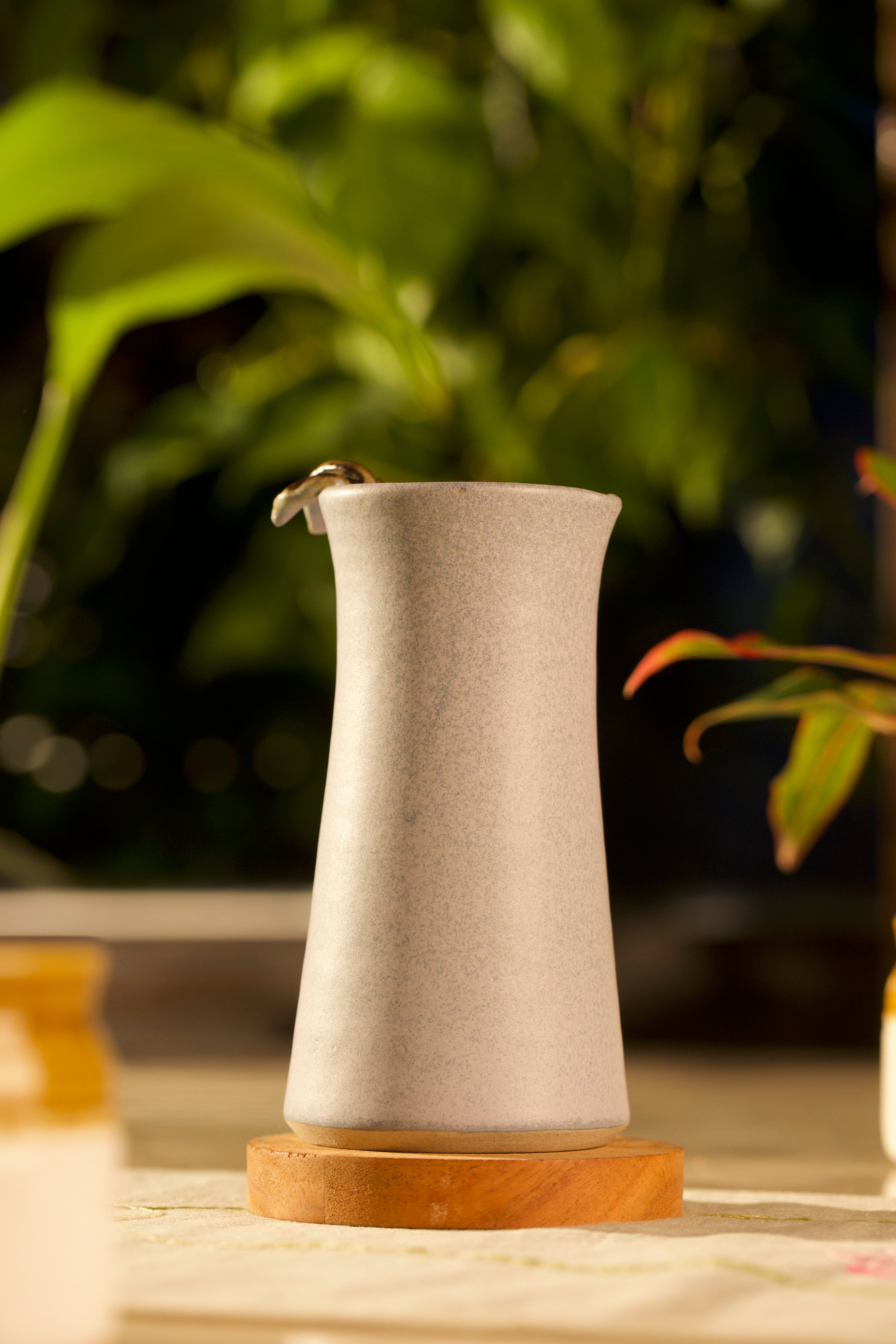 Gra ceramic pitcher and cup on a table, ceramic tableware India, pottery brands in India
 