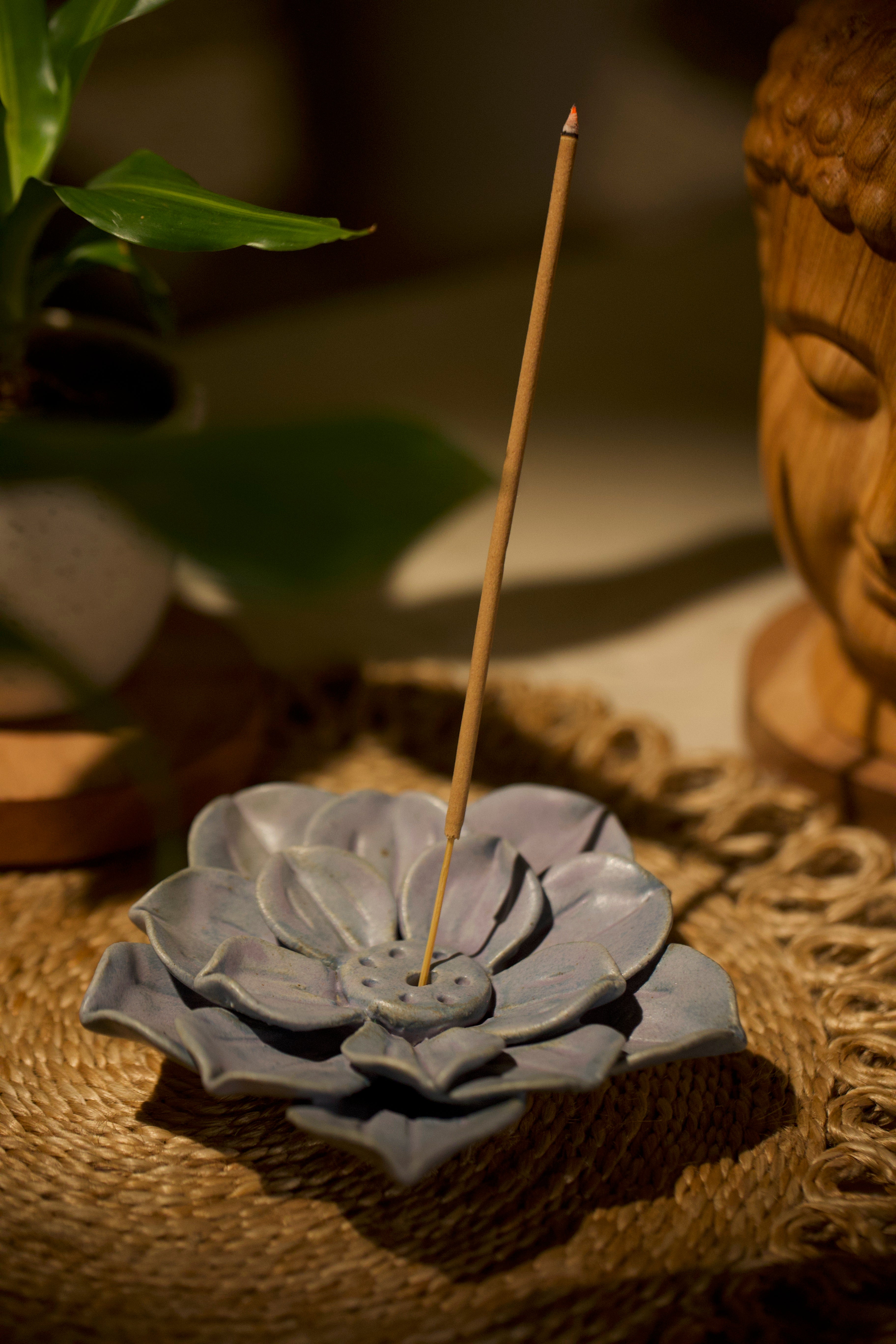 A grey lotus incense holder.  ceramic home décor online, artisanal home décor India
