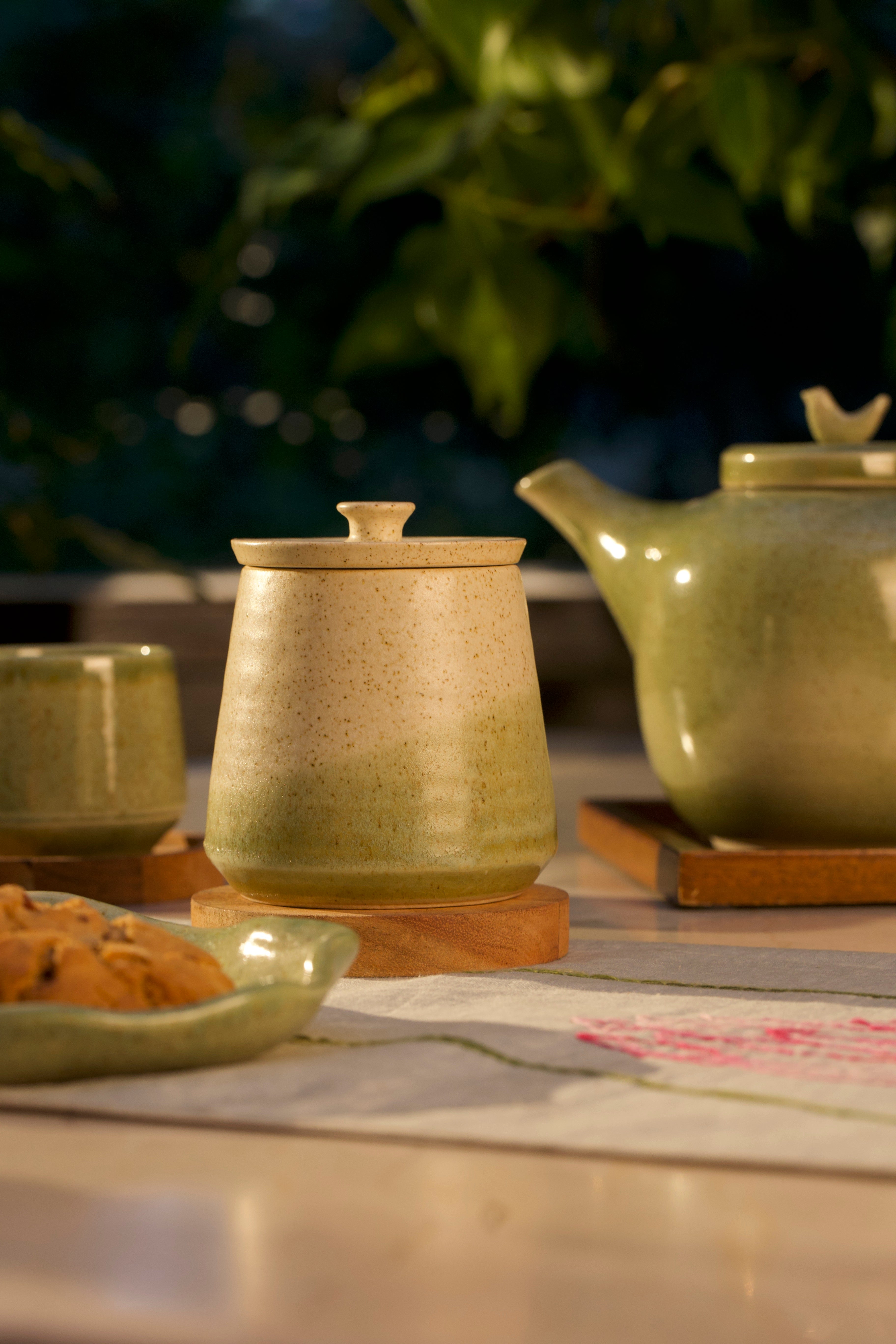 Green ceramic pot, Indian pottery brands online, handmade home essentials
