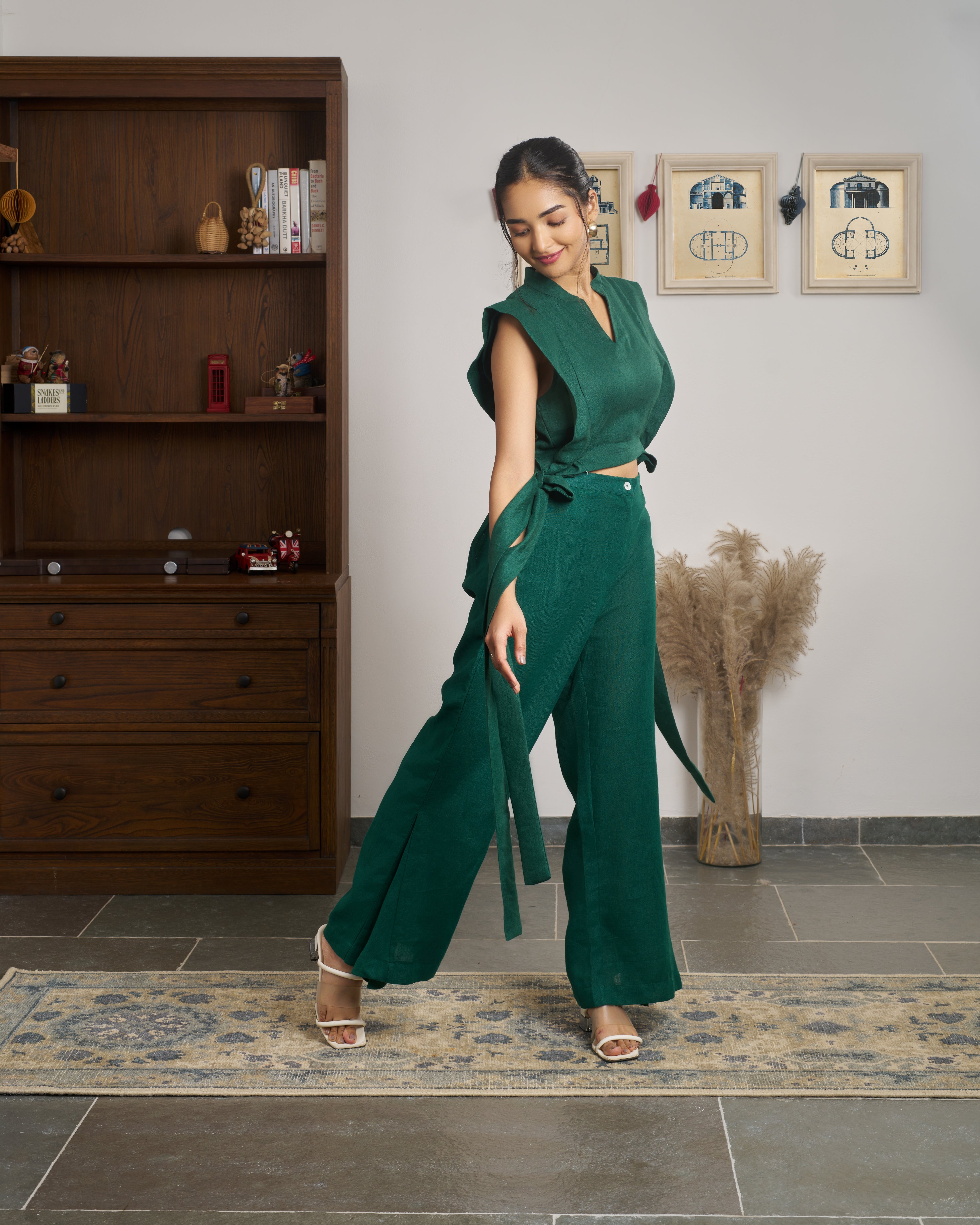 Woman wearing a green outfit.minimalist clothing brands India, everyday sustainable fashion India