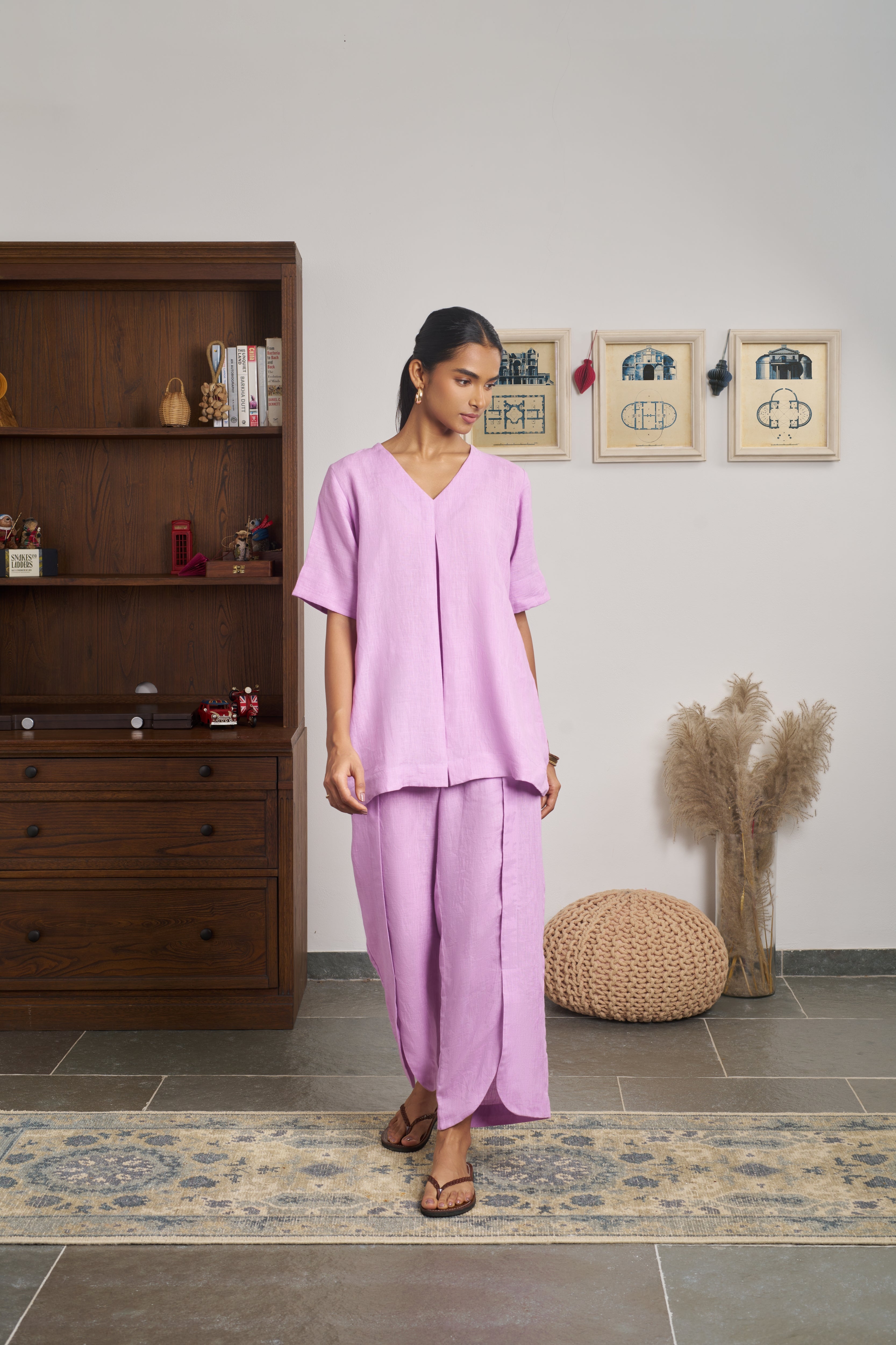 Woman in a pink outfit. women’s linen clothing India,  minimalist clothing brands India

