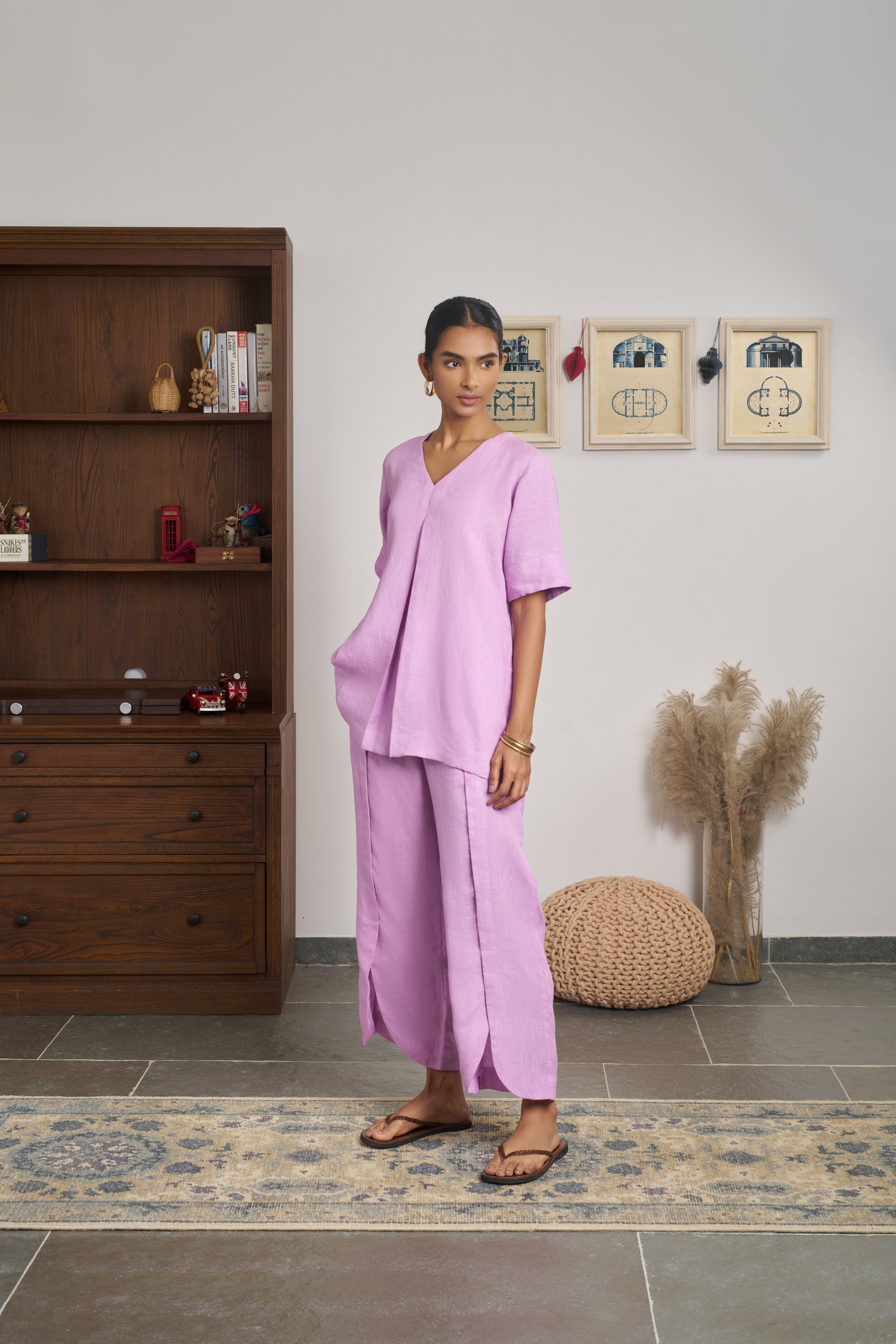 Woman in a pink outfit. women’s linen clothing India,  minimalist clothing brands India

