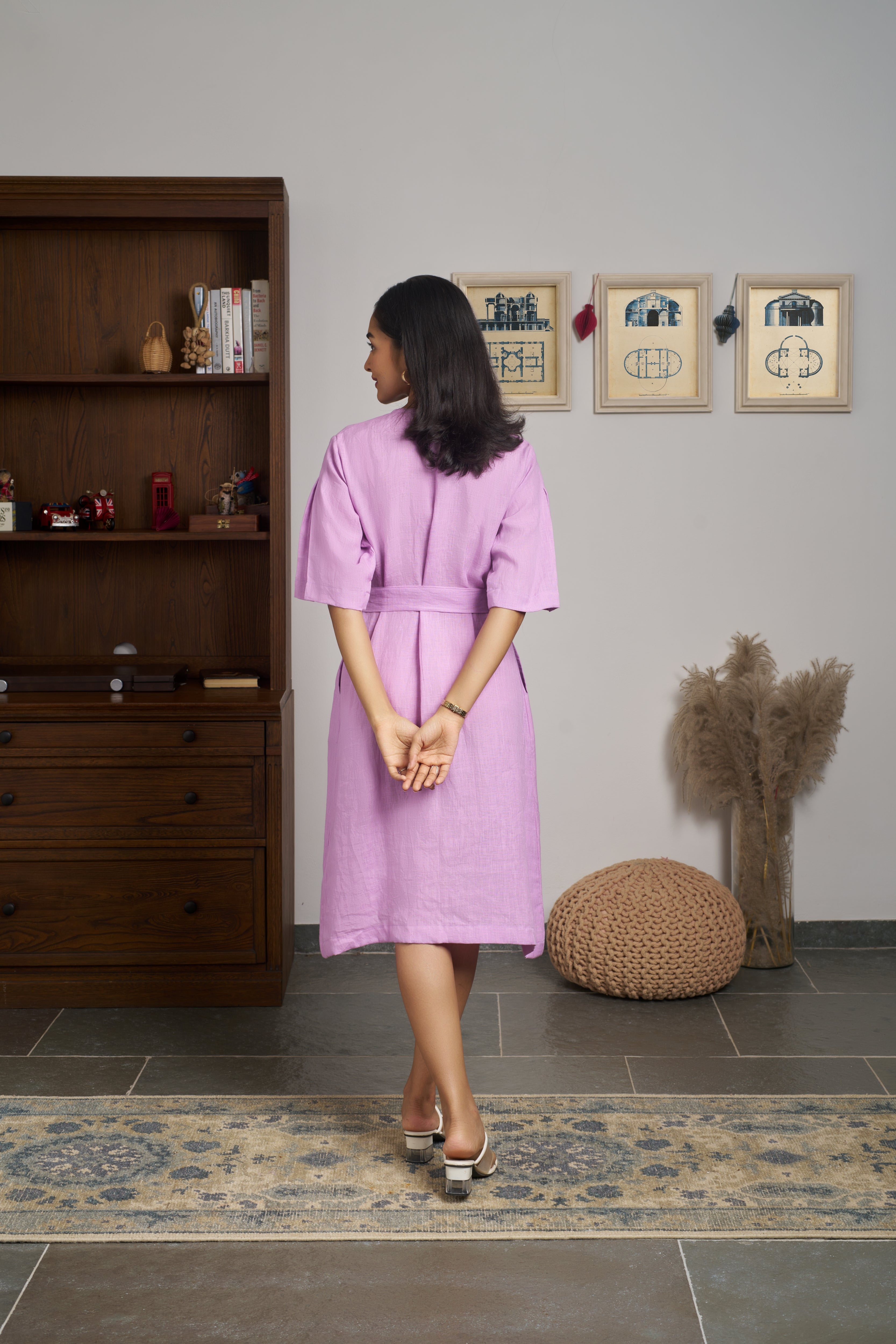 Woman in a pink dress. Womens resort wear mumbai, linen dresses shop online