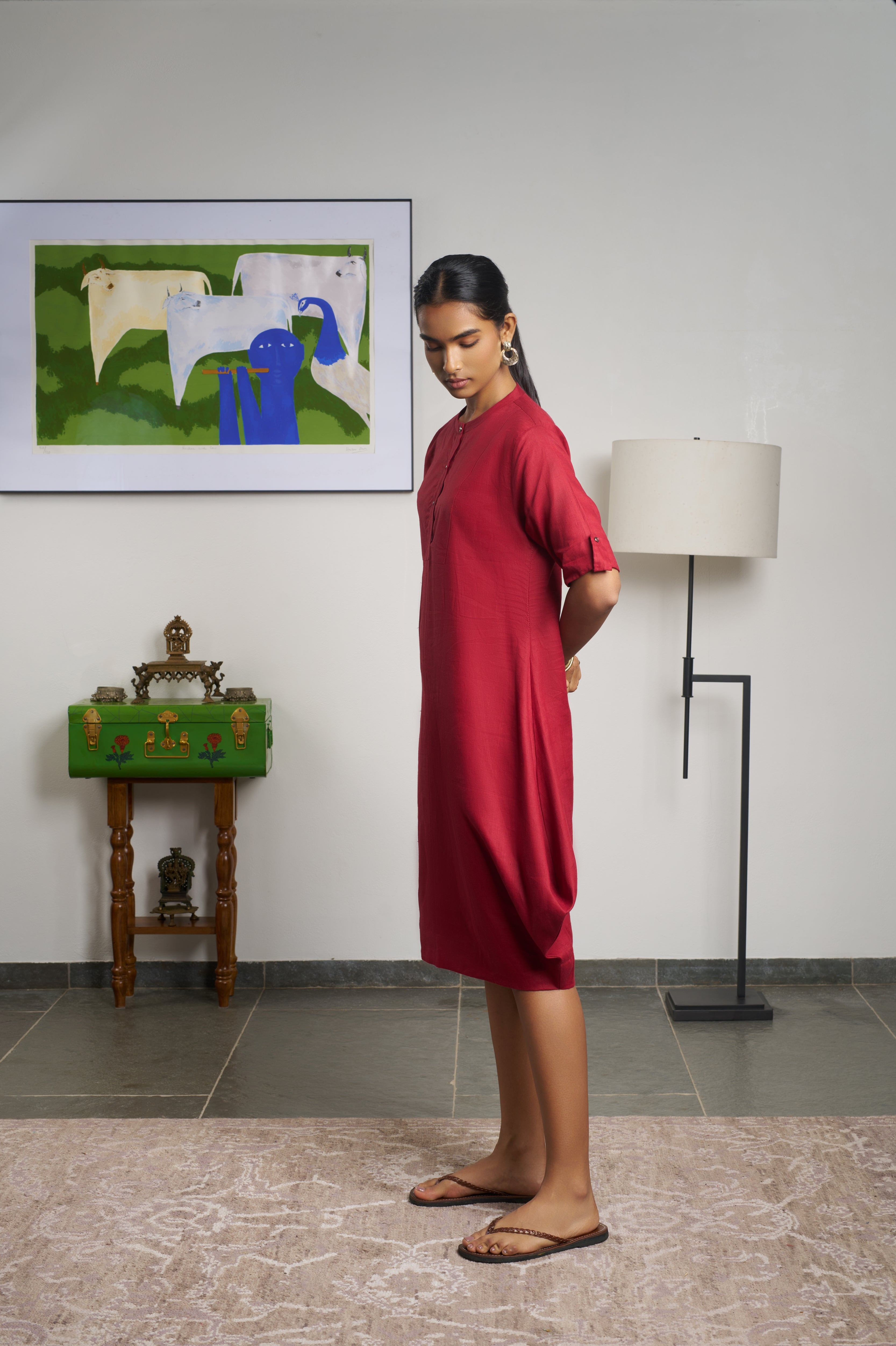 Woman in a red dress.  linen dresses shop online, everyday sustainable fashion India