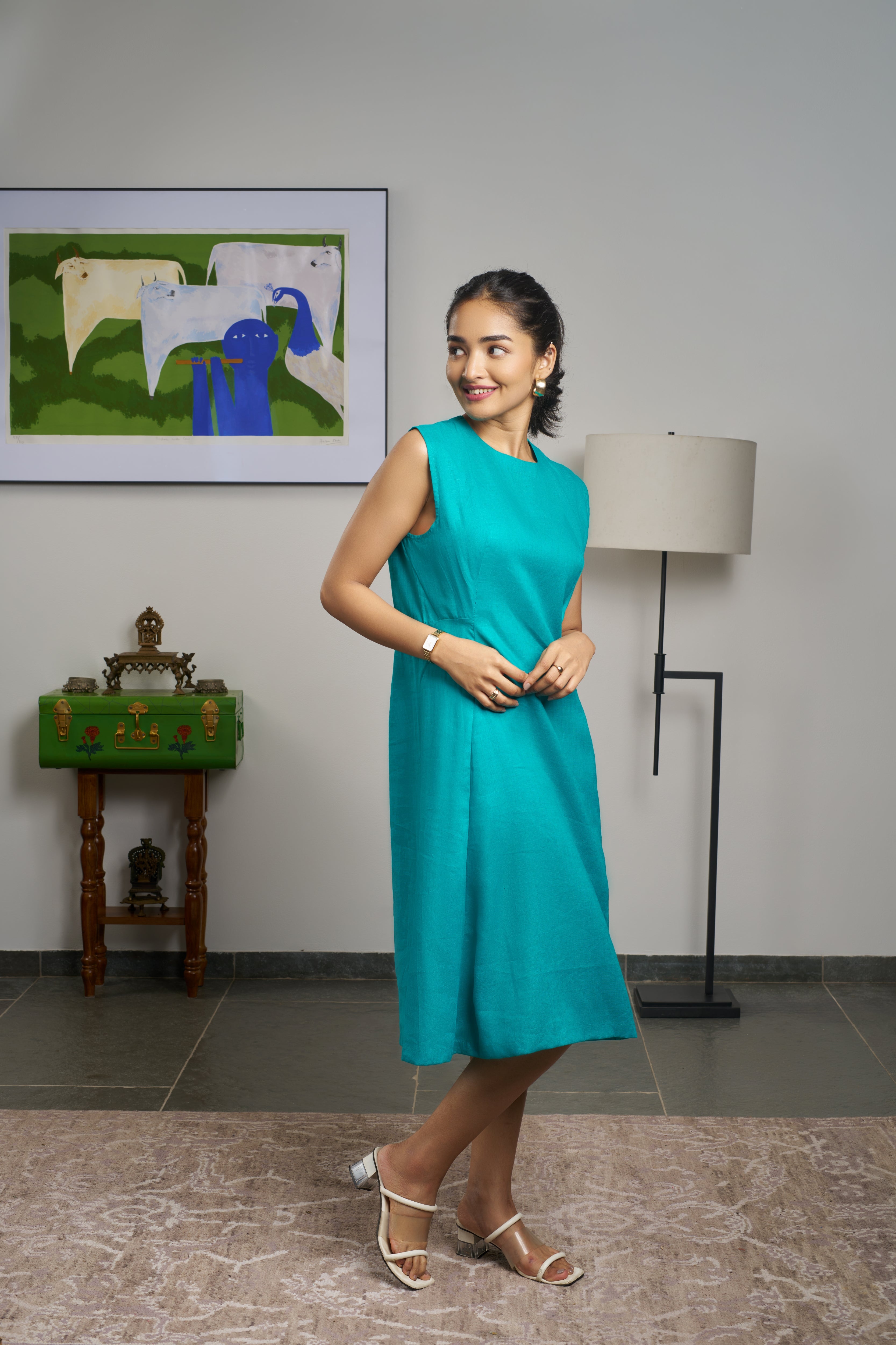 Woman in a teal blue dress. linen dresses for women India, comfortable linen dresses India
