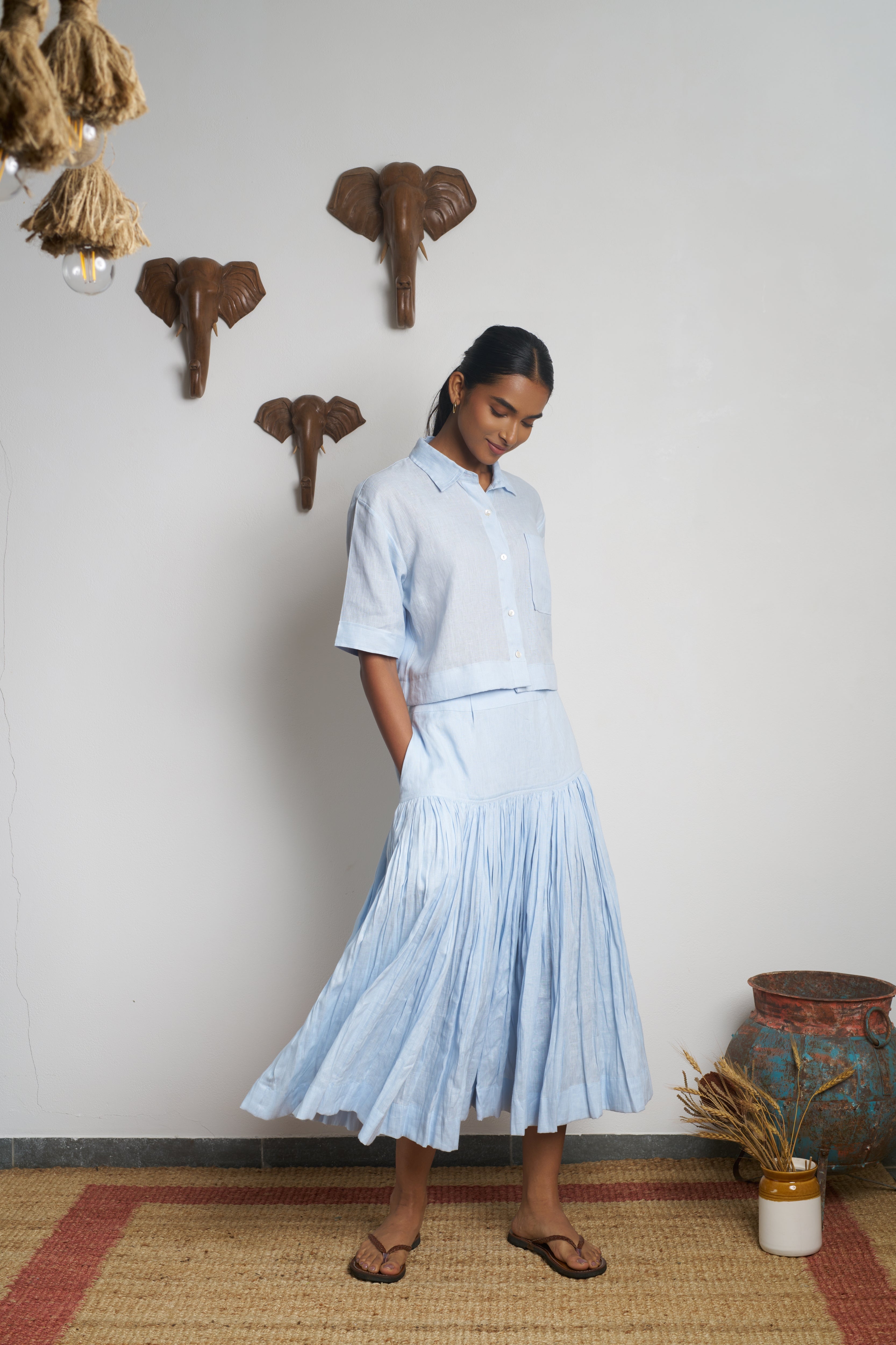 Woman in a light blue outfit.  women’s linen clothing India, 100% linen clothes India
