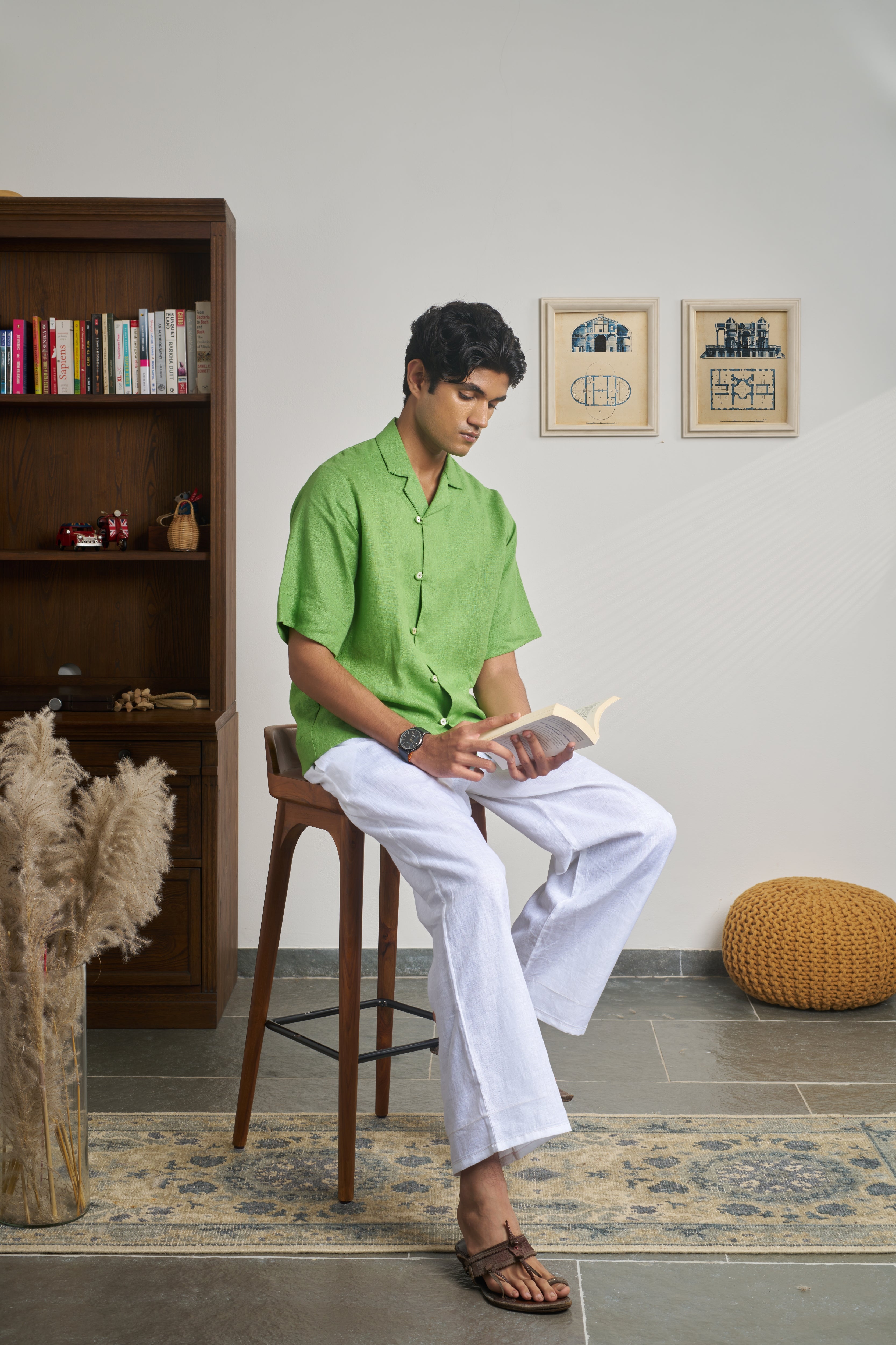 Man wearing a green shirt with short sleeves. men’s resort wear India, 
breathable linen shirts India