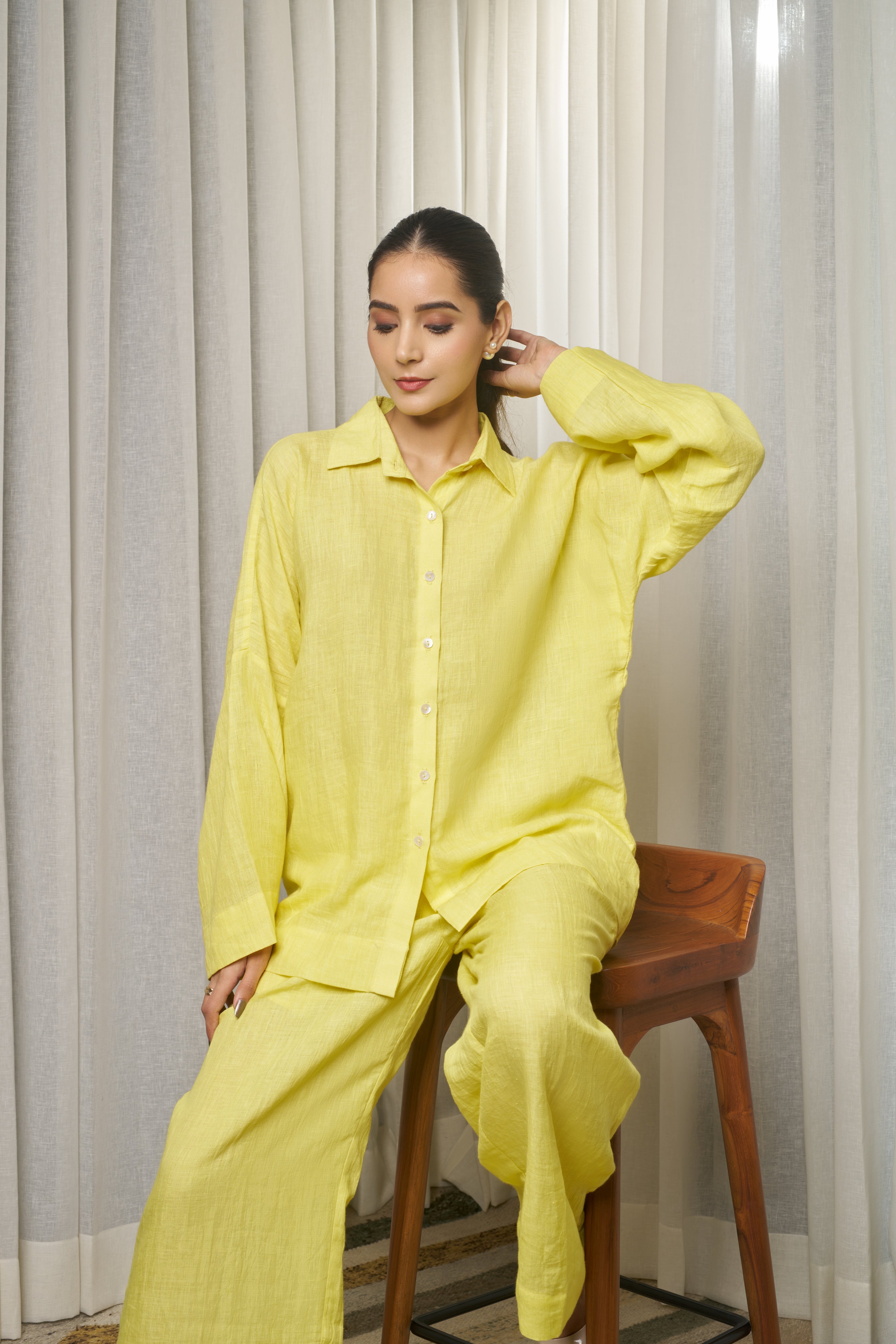 Woman in a yellow outfit. timeless women’s fashion, women’s linen clothing India
