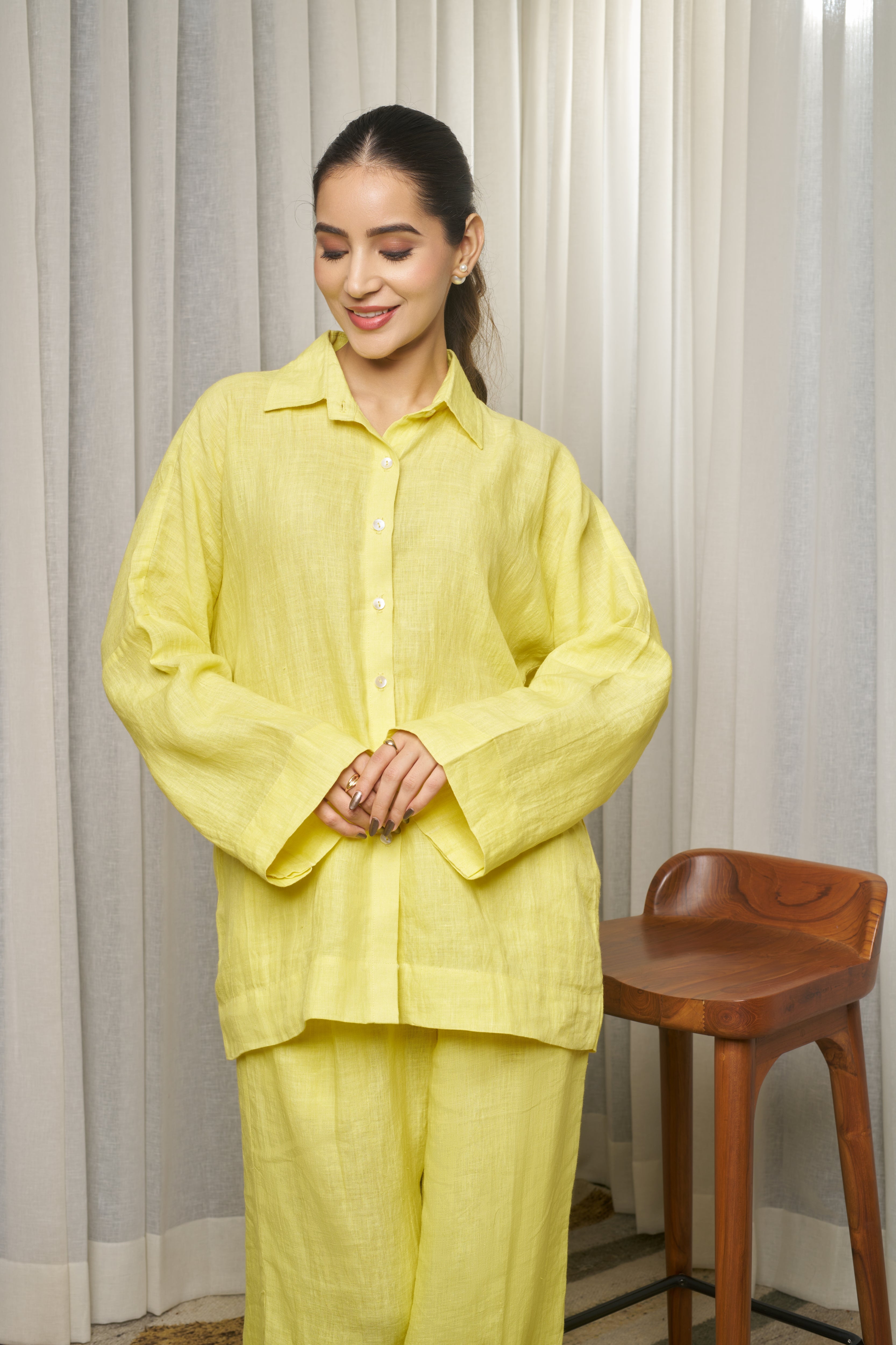 Woman in a yellow outfit. timeless women’s fashion, women’s linen clothing India
