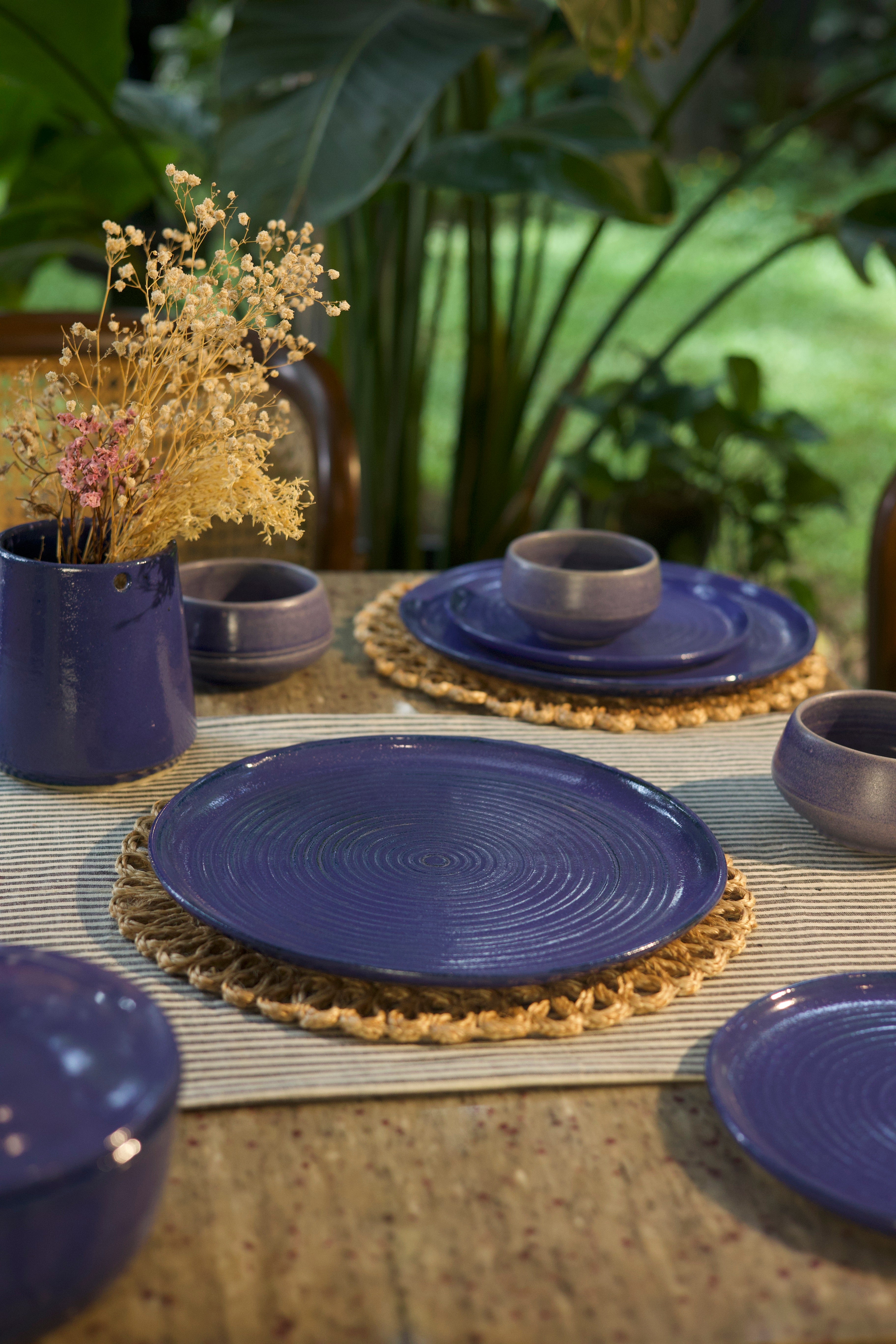 Set of blue ceramic plates and bowls on a table  handmade dinnerware India, handcrafted plates and bowls